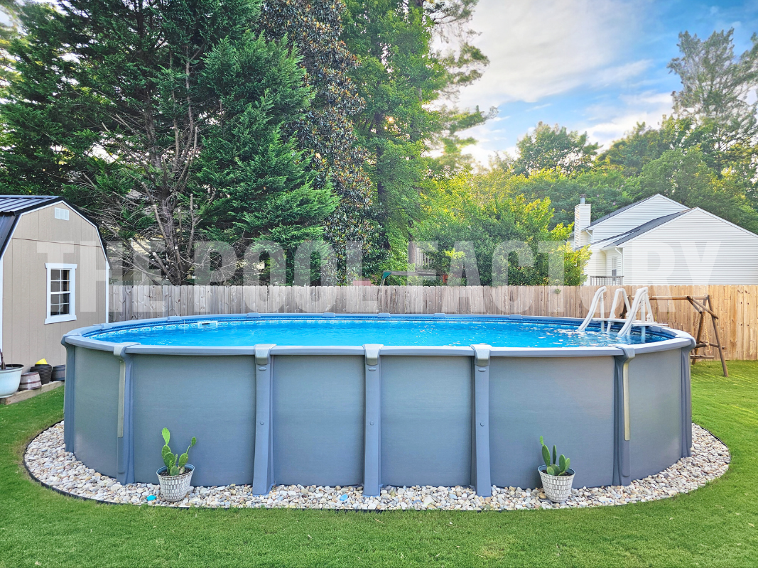 Oval above ground pool with forest landscape and greenery
