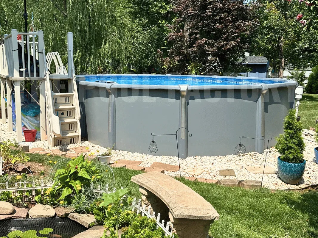 Oval saltwater above ground pool with resin composite pre-fab deck 