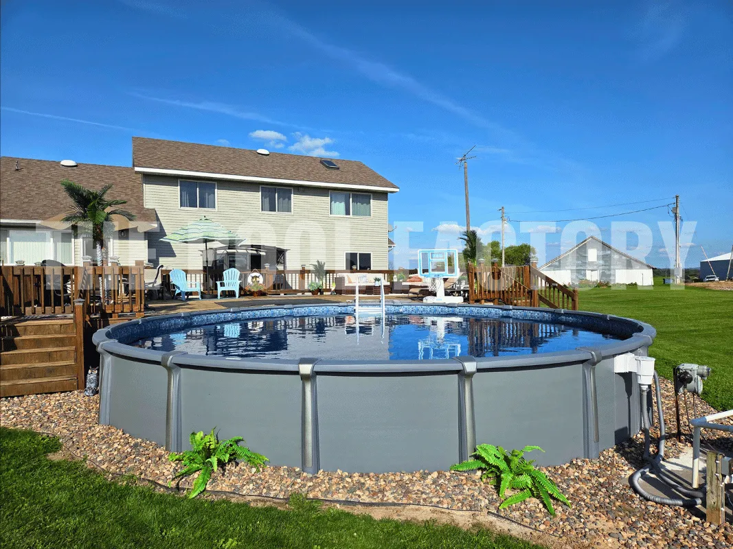 Modern saltwater above ground pool surrounded by lawn and outdoor deck