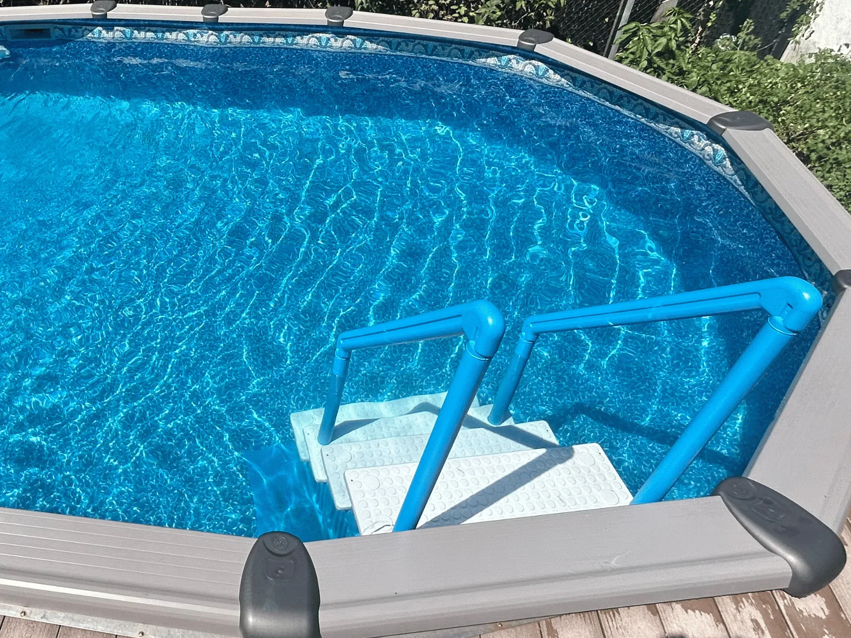 Beach Haven oval Uni-bead pool liner in a Saltwater Titan oval pool

