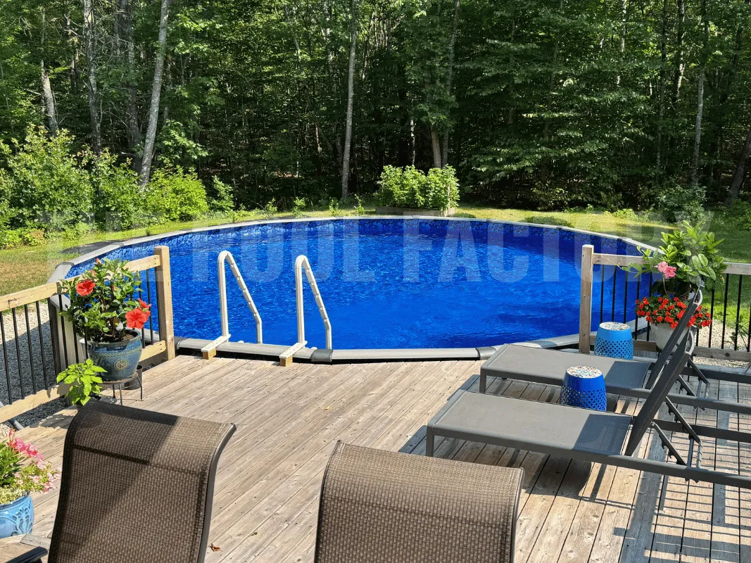 Round above ground pool surrounded by wood deck and reclining patio loungers