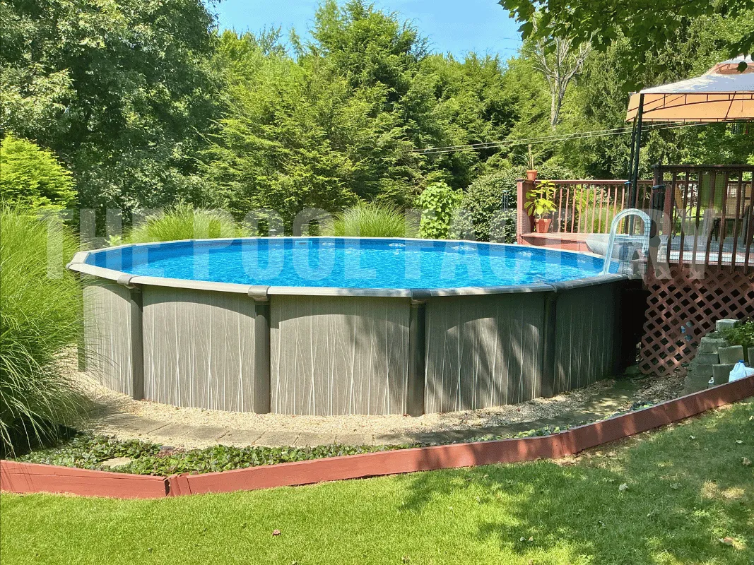 Above ground round swimming pool with partial deck for a cozy seating area
