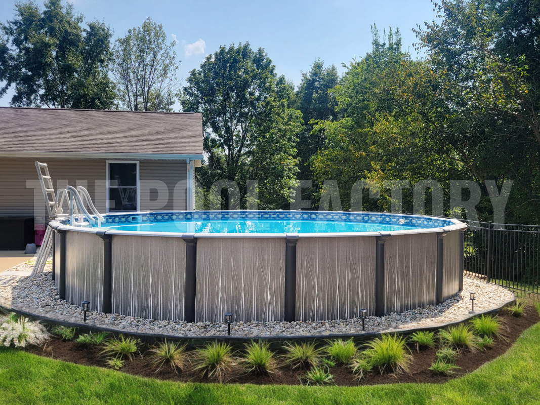 Round above ground pool surrounded by trees, shrubs, and sunny landscaping