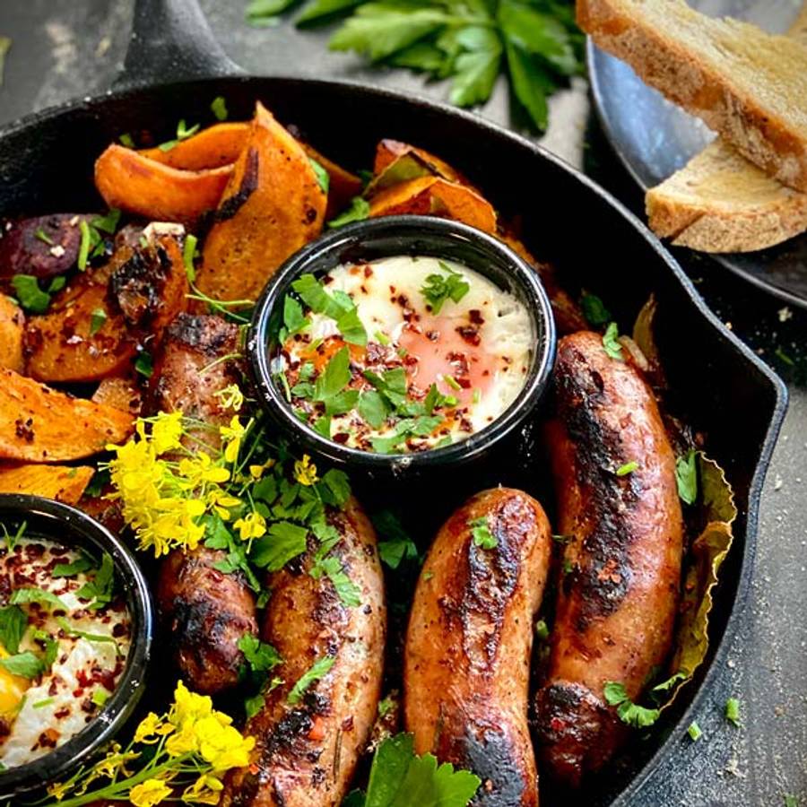 Ironclad Bangers with beer, kūmara and eggs served