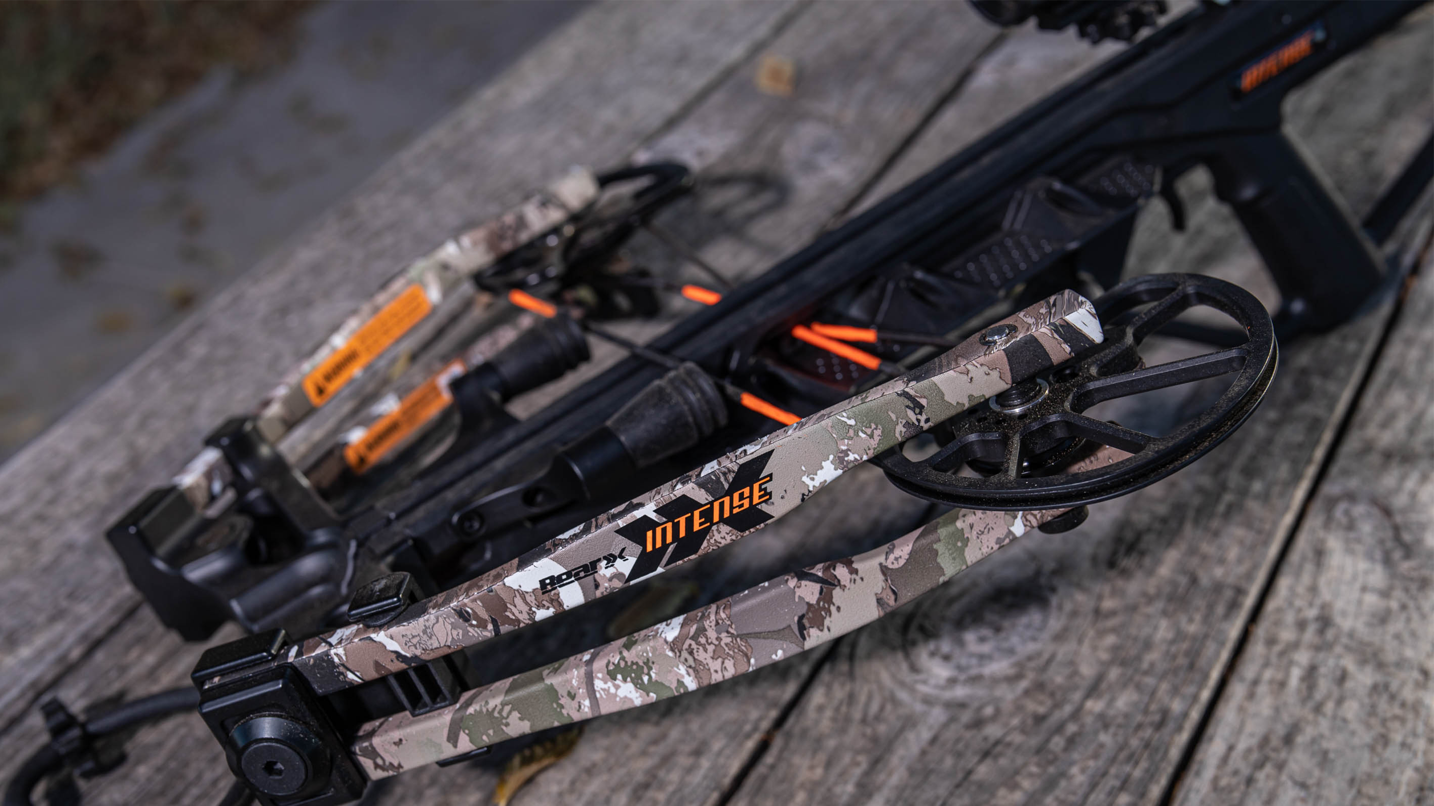 BearX Intense crossbow lying on a wooden deck