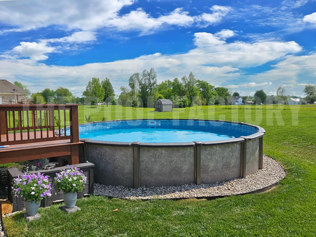 Backyard with a round saltwater swimming pool and surrounding decorative rocks