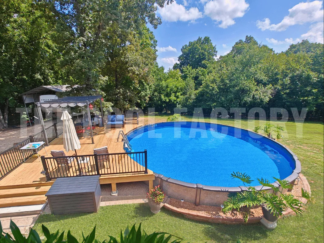 Round above ground pool with partial composite deck and lush green grass