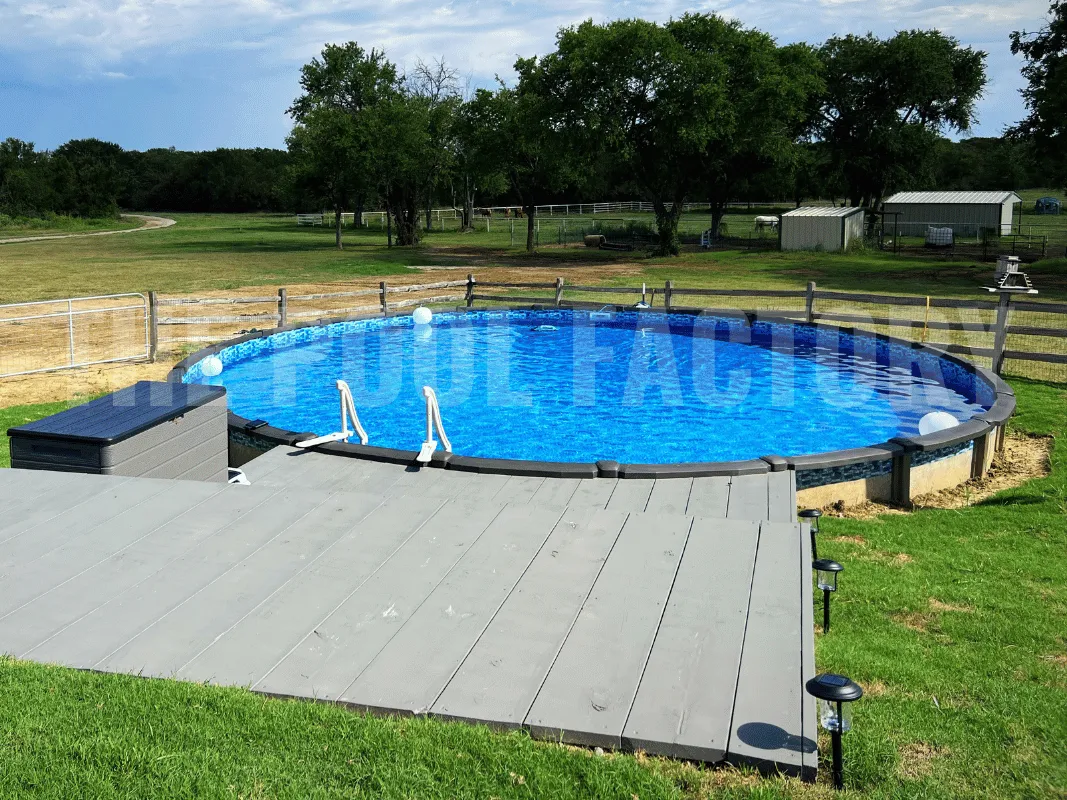 Round pool set in backyard with grass lawn, tall trees, and sunny afternoon light