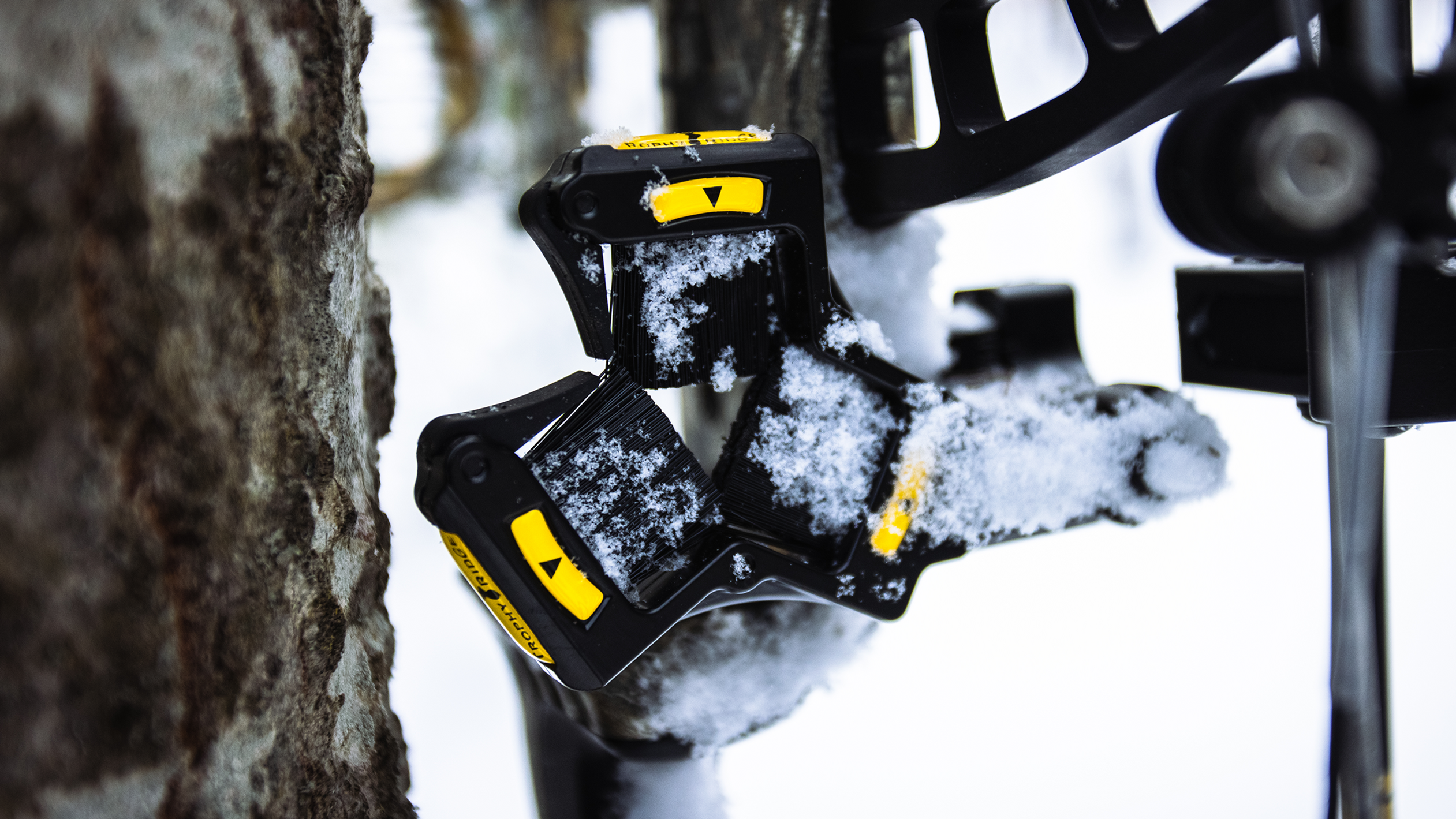 Close up of Trophy Ridge Whisker Biscuit V Max Arrow Rest with snow on it