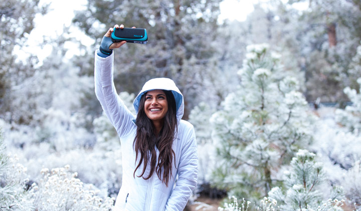 Bluetooth speaker playing in snow