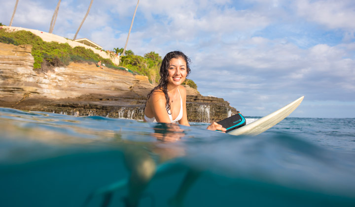 Bluetooth Speaker surfing in ocean