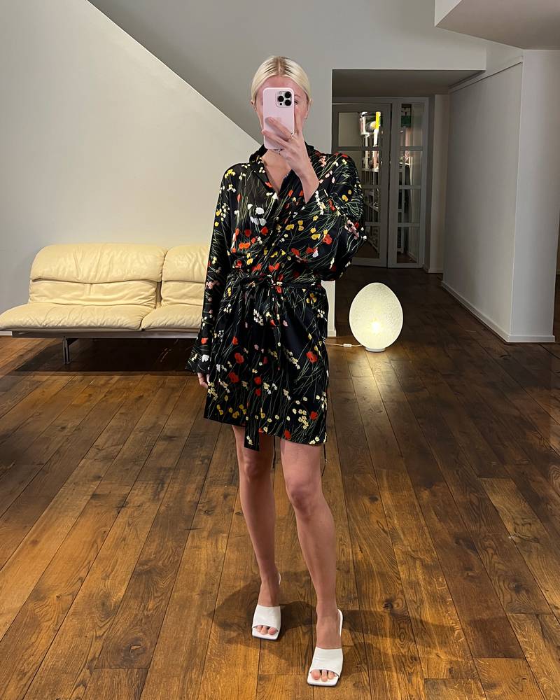 Bernadette Antwerp short silk satin peignoir. This short robe wrap dress is printed with the in-house drawn bouquets print on black.