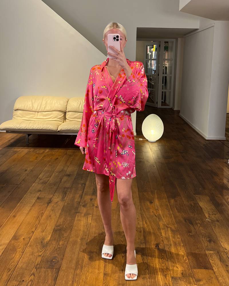 Bernadette Antwerp short silk satin peignoir. This short robe wrap dress is printed with the in-house drawn bouquets print on pink.