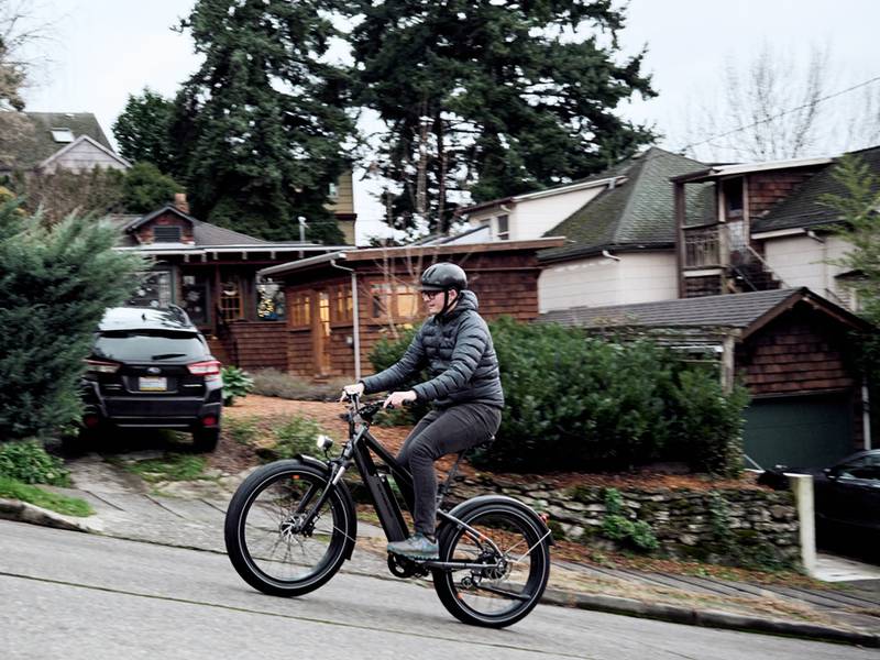 man riding uphill on radrover 6 plus