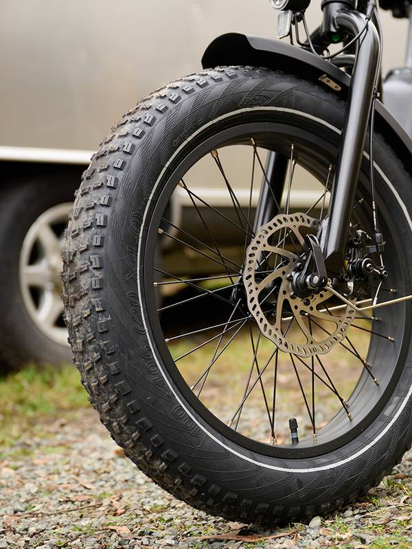 Close up of the wide front tire on a RadExpand ebike
