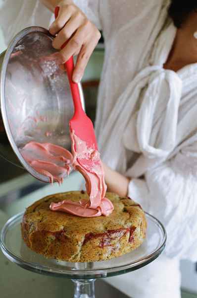 Lemon Strawberry Poppy Seed Cake KitEditorial Image of person making cake