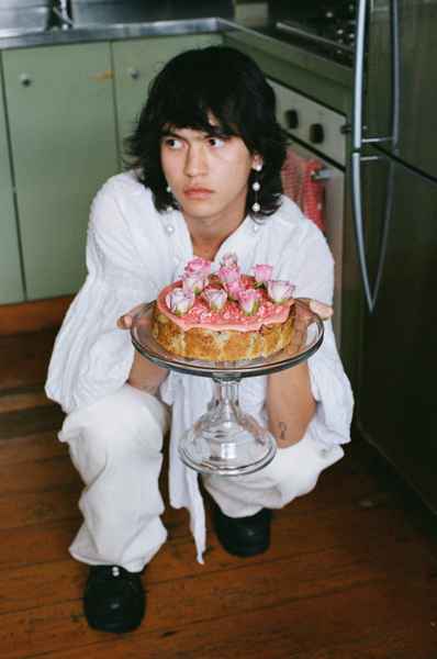 Lemon Strawberry Poppy Seed Cake KitEditorial Image of person making cake