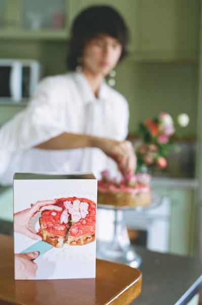 Lemon Strawberry Poppy Seed Cake KitEditorial Image of person making cake