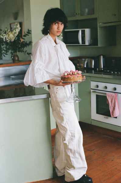 Lemon Strawberry Poppy Seed Cake KitEditorial Image of person making cake