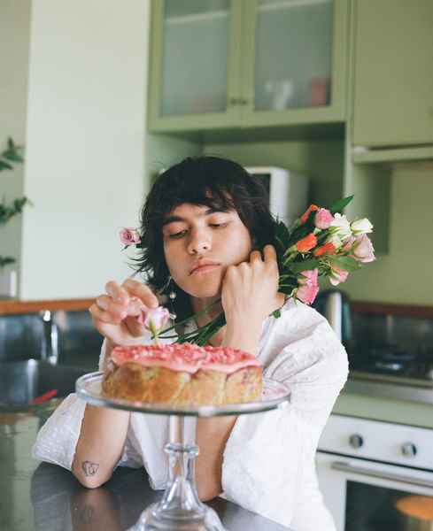 Lemon Strawberry Poppy Seed Cake KitEditorial Image of person making cake