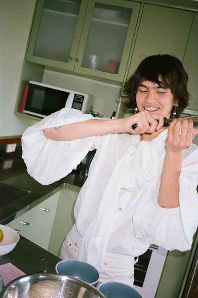 Lemon Strawberry Poppy Seed Cake KitEditorial Image of person making cake
