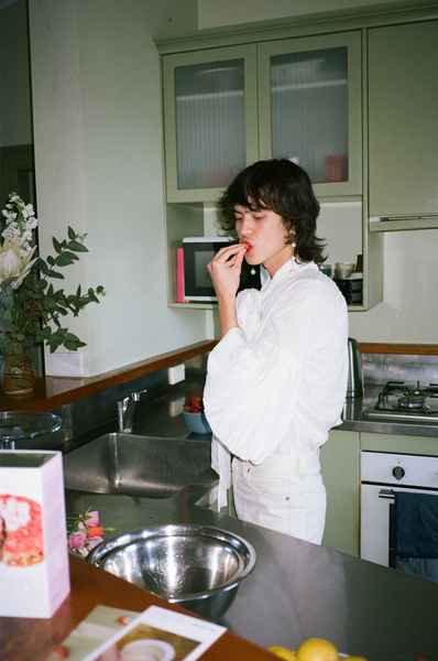 Lemon Strawberry Poppy Seed Cake KitEditorial Image of person making cake