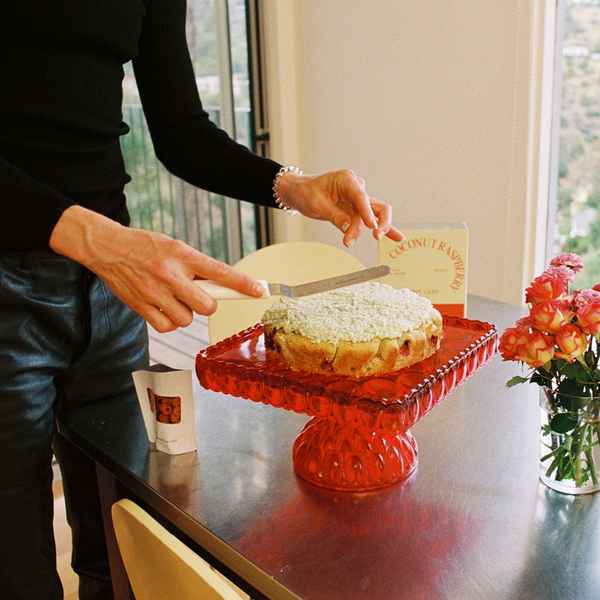 Coconut Raspberry Lime Leaf Cake KitEditorial Image of person making cake
