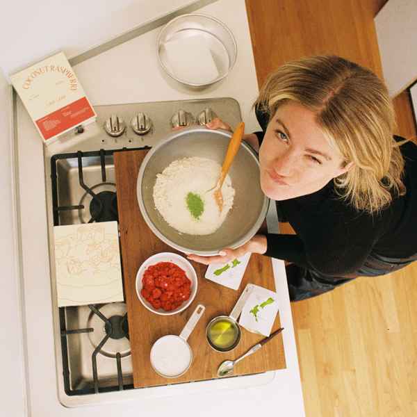 Coconut Raspberry Lime Leaf Cake KitEditorial Image of person making cake
