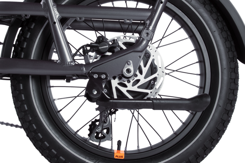 closeup of hydraulic disc brakes on an electric bike for heavy riders