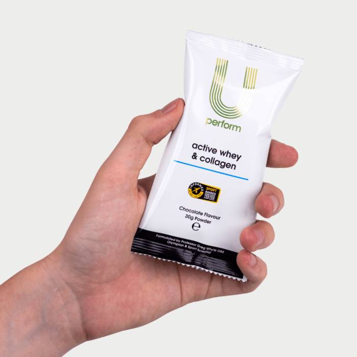 U Perform Active Whey & Collagen 30g Sachet Chocolate Flavour In Hand