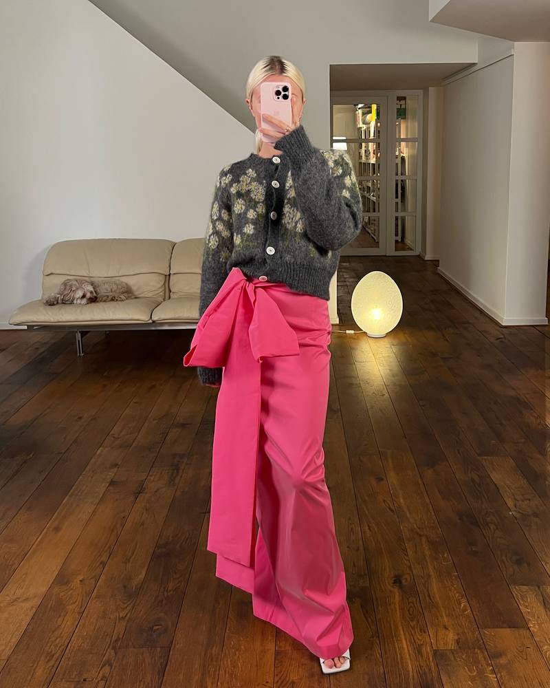 Bernadette Antwerp skirt Bernard in hot pink is made from taffeta fabric and features a bow around the waist.