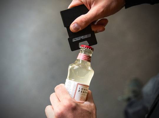 Bottle opener annex an cardholder