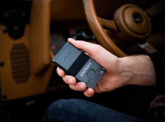 Hand holding an Aluminum Cardholder
