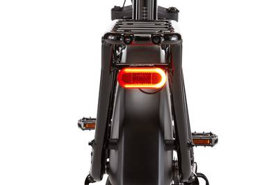 Detailed image of the rear-facing turn signals on the RadWagon 5 Plus. 