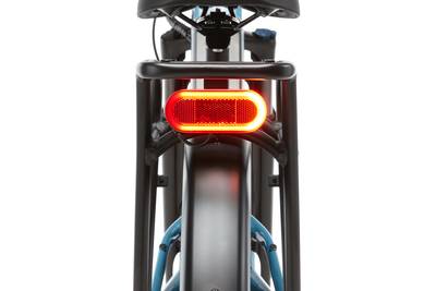 Cropped image showing the turn signal feature that is part of the rear light on the Radster Road electric commuter bike.