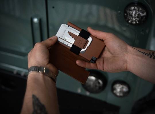 Tool card being stored in leather wallet