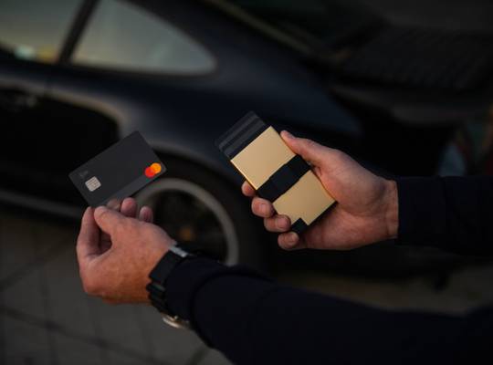 18K Gold Cardholder held in hand