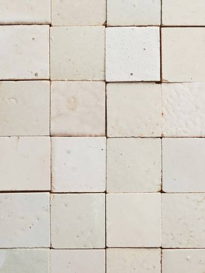 close up of clé tile eastern elements terracotta 2x2 tiles laid side by side