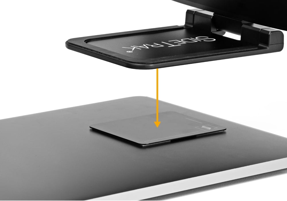 SideTrak  Tablet Mount  portable monitor mount hovering over a laptop with an arrow pointing towards the magnetic connection for attachment