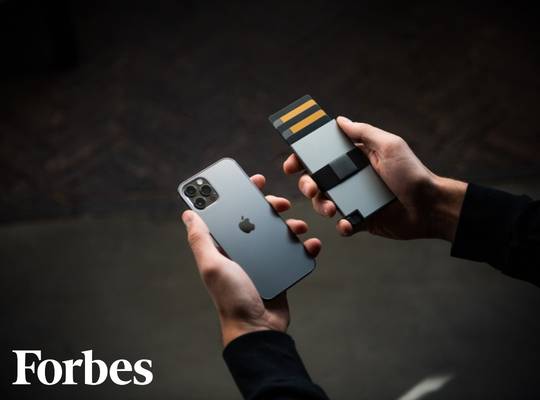Iphone held naxt to matching  Aluminum Cardholder