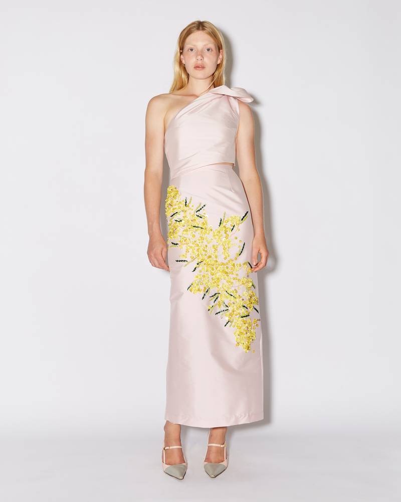 Bernadette Antwerp skirt Norma is an ankle-length pencil skirt made from taffeta fabric and adorned with hand-embroidered mimosa print on a blush pink base.