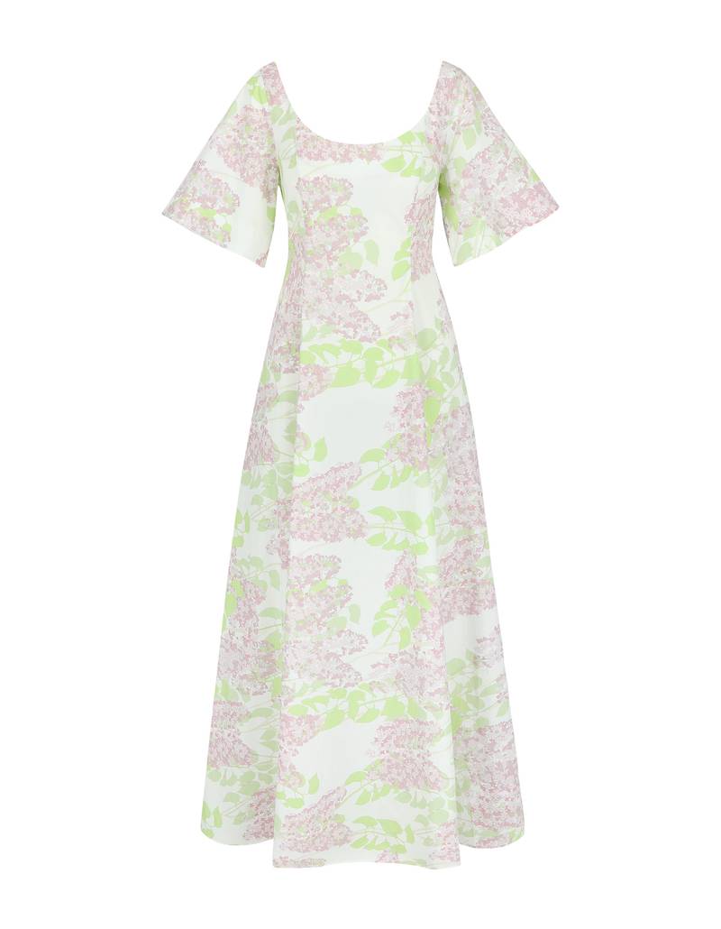 Bernadette Antwerp dress Maude is made from cotton, features short sleeves, an accentuated waistline, and a boat-neckline that flows into a grand floor-length gown. Evening wear dress adorned with Lilacs floral print in colors Pink and White. 