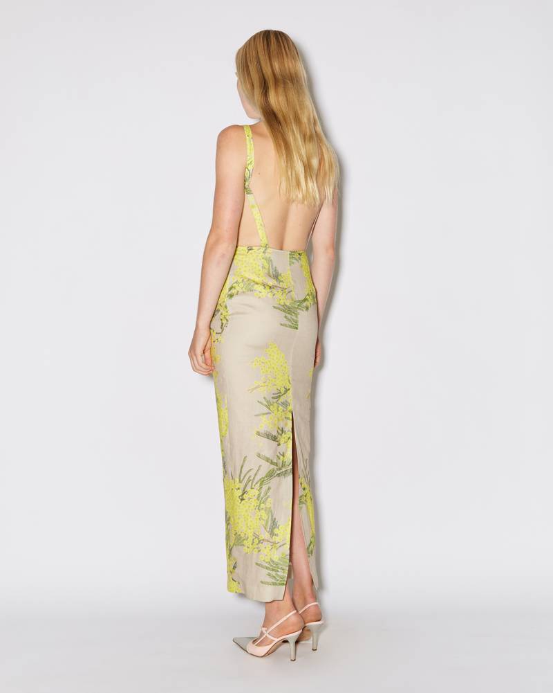 Bernadette Antwerp midi dress Kimberly is an ankle-length dress made from linen featuring a straight neckline and shoulder straps that run over the open back elegantly. Adorned with the Mimosa print on beige drawn in-house. 