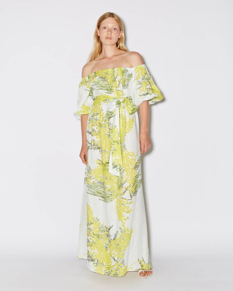 Bernadette Antwerp dress Zaza is a floor-length dress made from linen, featuring a straight neckline, poofy off-the-shoulder sleeves and a detachable belt to accentuate the waist. Dress Zaza is adorned with the Mimosa print on White.