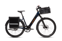 RadKick Belt Drive in Midnight Blue equipped with hard shell panniers, a large front-mounted basket, roll-top basket liner and a phone mount.