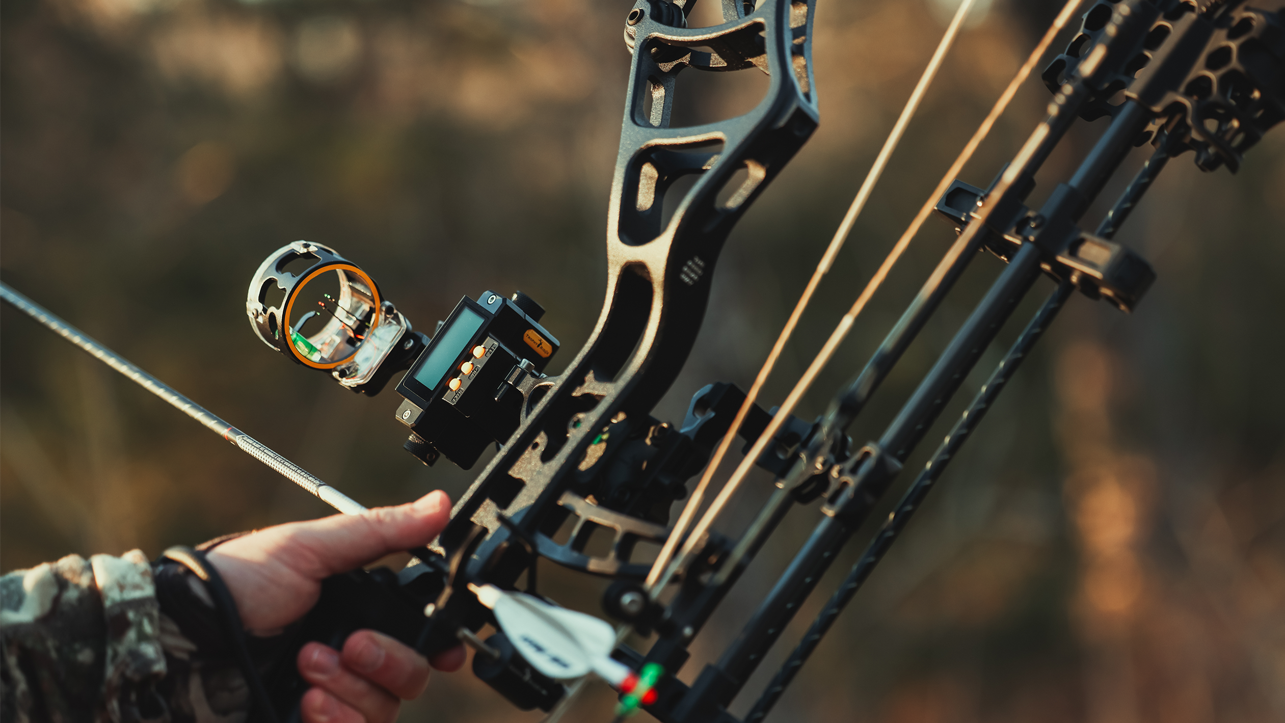 Close up of a Trophy Ridge Digital React® Trio Pro Bow Sight on a bow