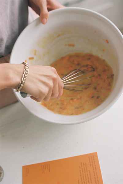 Spiced Carrot Cake Kit with Salted CaramelEditorial Image of person making cake
