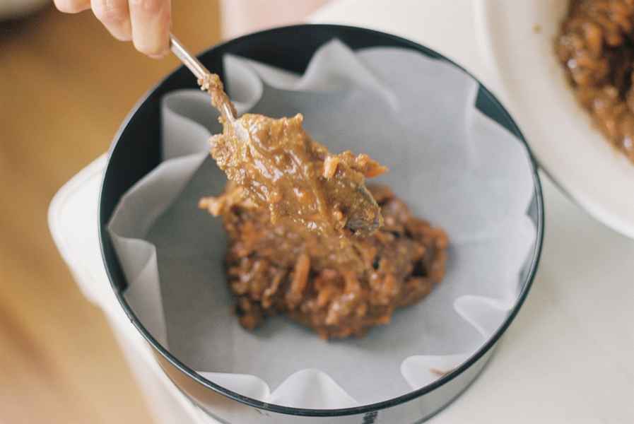 Spiced Carrot Cake Kit with Salted CaramelEditorial Image of person making cake