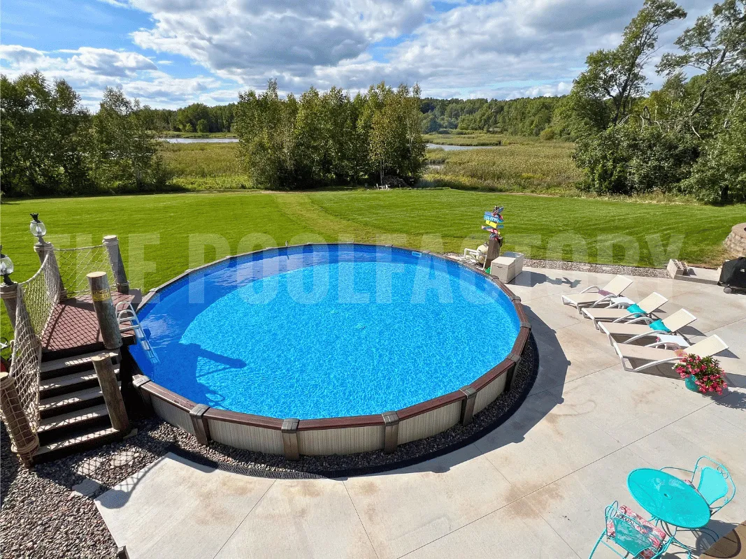 Contemporary above ground pool surrounded by concrete deck and cozy seating area
