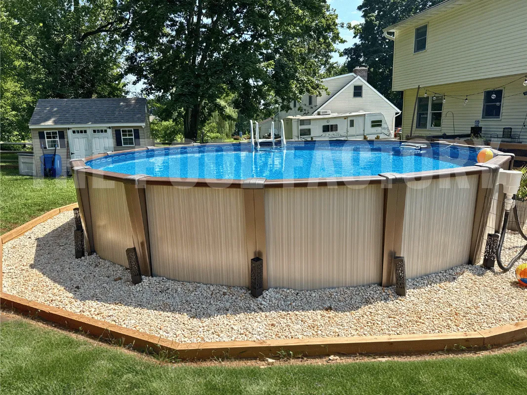Round above ground pool with landscaped yard and decorative surrounding border
